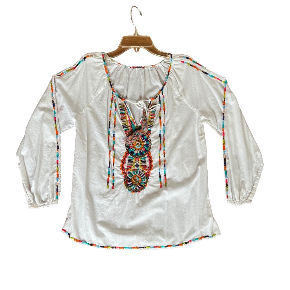 100% cotton top with beads embroidery details.
